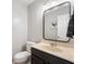 This bathroom features a marble-look sink, modern lighting, and neutral paint color at 6459 Titania Dr, Indianapolis, IN 46236
