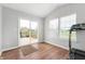 Sun-filled room with sliding door to deck and large windows at 6459 Titania Dr, Indianapolis, IN 46236