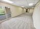 Finished basement with carpet, closet and a view of the outdoors at 6618 Crystal Springs Dr, Avon, IN 46123
