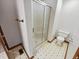 Bathroom featuring a glass shower and toilet at 6618 Crystal Springs Dr, Avon, IN 46123