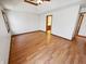 Large bedroom featuring wood floors and an ensuite bathroom entrance at 6618 Crystal Springs Dr, Avon, IN 46123