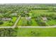 Expansive estate with lush green lawns, mature trees and a sparkling pool offering a private oasis at 6990 Old Hunt Club Rd, Zionsville, IN 46077