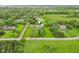 Expansive estate with lush green lawns, mature trees and a sparkling pool offering a private oasis at 6990 Old Hunt Club Rd, Zionsville, IN 46077