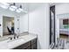 Bright bathroom with a stylish vanity, sink, and mirror reflecting the home's modern design and open layout at 6990 Old Hunt Club Rd, Zionsville, IN 46077