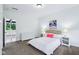Well-lit bedroom with a comfortable bed, stylish furnishings, and a view to an upper-level balcony at 6990 Old Hunt Club Rd, Zionsville, IN 46077