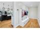 Mud room featuring built in storage and access to the kitchen at 6990 Old Hunt Club Rd, Zionsville, IN 46077