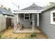 Back patio with outdoor seating and overhead covering at 71 S 9Th Ave, Beech Grove, IN 46107