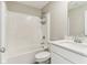Clean bathroom with shower-tub combination and white cabinets at 7277 Governors Row, Avon, IN 46123