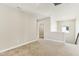 Neutral bedroom with carpet and a glimpse of a closet with a clothing rack at 7277 Governors Row, Avon, IN 46123