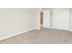 Bedroom featuring sliding closet doors and neutral carpet at 7277 Governors Row, Avon, IN 46123