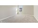 Bedroom with neutral carpet and window at 7277 Governors Row, Avon, IN 46123