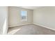 Bedroom with neutral carpet, one window and light beige walls at 7277 Governors Row, Avon, IN 46123