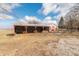 Well-maintained red barn with open storage area perfect for tools or storage at 7561 N Hall School Rd, Monrovia, IN 46157