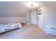Bedroom includes basketball hoop, toddler bed set with toys, table and chair set, storage chest, and door at 7561 N Hall School Rd, Monrovia, IN 46157