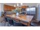 Well-lit kitchen showcasing a unique butcher block island and stainless steel appliances at 7561 N Hall School Rd, Monrovia, IN 46157