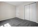 Bedroom with plush gray carpeting, closet, and neutral paint, creating a calming atmosphere at 7652 Wood Stream Dr, Indianapolis, IN 46239