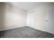 Bedroom featuring neutral walls, plush gray carpeting and a closet at 7652 Wood Stream Dr, Indianapolis, IN 46239