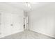 Bright bedroom featuring neutral carpet, and closet with doors at 769 Raintree Dr, Avon, IN 46123