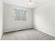Neutral bedroom with a ceiling fan and plush carpeting at 769 Raintree Dr, Avon, IN 46123