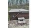 Outdoor hot tub with cover and steps, perfect for relaxing after a long day at 769 Raintree Dr, Avon, IN 46123