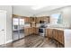 Modern kitchen features stainless steel appliances, wood cabinets and ample counter space at 769 Raintree Dr, Avon, IN 46123