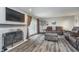 Relaxing living room featuring new floors, a fireplace, and access to the deck for outdoor enjoyment at 8140 Shorewalk Dr # C, Indianapolis, IN 46236