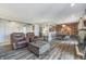 Living area showcasing new floors, dining area access, and comfortable seating arrangements at 8140 Shorewalk Dr # C, Indianapolis, IN 46236