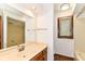 Bathroom with a large mirror and single vanity sink at 8242 Windhaven Cir, Indianapolis, IN 46236