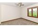 Bedroom with neutral carpet and wooded window trim at 8242 Windhaven Cir, Indianapolis, IN 46236