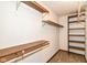 Walk-in closet with shelving and carpeted floor at 8242 Windhaven Cir, Indianapolis, IN 46236