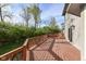 Large, inviting wooden deck perfect for outdoor dining and relaxation with a view of the lush backyard at 8242 Windhaven Cir, Indianapolis, IN 46236