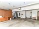 Spacious two-car garage with built-in storage cabinets and ample room for parking and projects at 8242 Windhaven Cir, Indianapolis, IN 46236