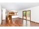 Open living room leading to kitchen area and outside deck at 8242 Windhaven Cir, Indianapolis, IN 46236