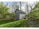Durable storage shed in a well-maintained backyard, providing ample space for tools and equipment at 8242 Windhaven Cir, Indianapolis, IN 46236