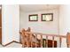 Staircase with wood railings and a view of the front door at 8242 Windhaven Cir, Indianapolis, IN 46236