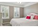 Bedroom with two windows bringing in lots of natural light and a comfortable bed at 8277 Plumwood Ln, Indianapolis, IN 46256