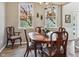 Bright dining area with natural light and access to outdoors creating an inviting space at 8277 Plumwood Ln, Indianapolis, IN 46256