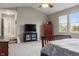 Spacious main bedroom with vaulted ceiling, a TV, and multiple windows at 8277 Plumwood Ln, Indianapolis, IN 46256