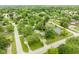 Aerial view of a charming home on a tree-lined street with well-manicured lawns at 840 N Indiana St, Mooresville, IN 46158