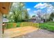 Large wooden deck overlooking a spacious backyard with lush green grass at 840 N Indiana St, Mooresville, IN 46158