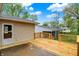Backyard with a new wooden deck, providing outdoor living space at 840 N Indiana St, Mooresville, IN 46158