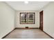 Bedroom with hardwood floors, neutral paint, modern trim and a window with natural light at 840 N Indiana St, Mooresville, IN 46158