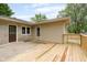 Wooden deck offering a cozy outdoor area with access to both doors, perfect for relaxation and entertainment at 840 N Indiana St, Mooresville, IN 46158