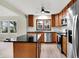 Eat-in kitchen featuring stainless appliances and island at 840 N Indiana St, Mooresville, IN 46158