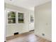Bright kitchen featuring white walls, a new door and windows with natural light at 840 N Indiana St, Mooresville, IN 46158