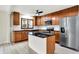Eat-in kitchen featuring stainless appliances and island at 840 N Indiana St, Mooresville, IN 46158