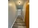 A light-filled hallway with vinyl plank flooring at 89 Judy Dr, Martinsville, IN 46151