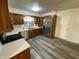 Charming kitchen with stainless steel appliances, wood cabinets, and a window above the sink at 89 Judy Dr, Martinsville, IN 46151