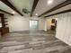 Inviting sun room with brick wall, neutral carpet, and an abundance of natural light at 89 Judy Dr, Martinsville, IN 46151