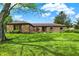Charming brick ranch home with a well-manicured lawn and mature landscaping, perfect for suburban living at 8906 N County Road 1050 E, Brownsburg, IN 46112